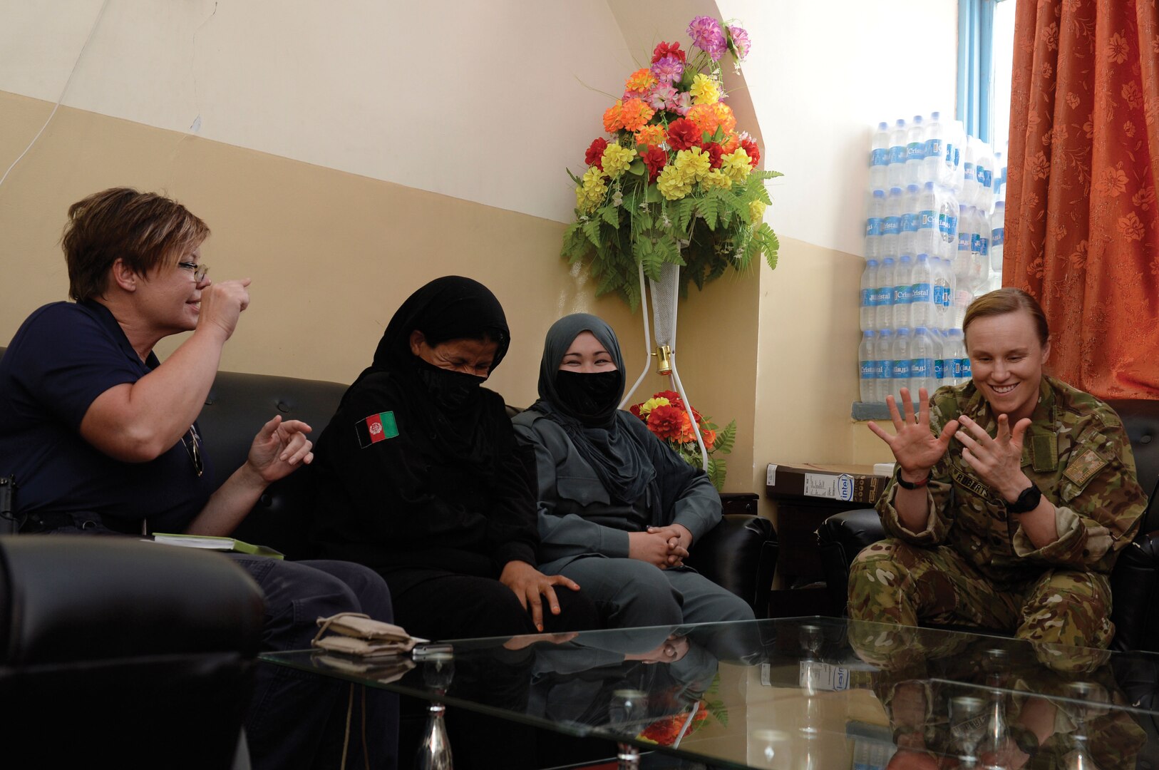 Women with the Afghan Border Police and members of the Train, Advise, and Assist Command - South
come together to discuss gender integration in the Afghan security forces, as part of NATO’s Resolute
Support Mission