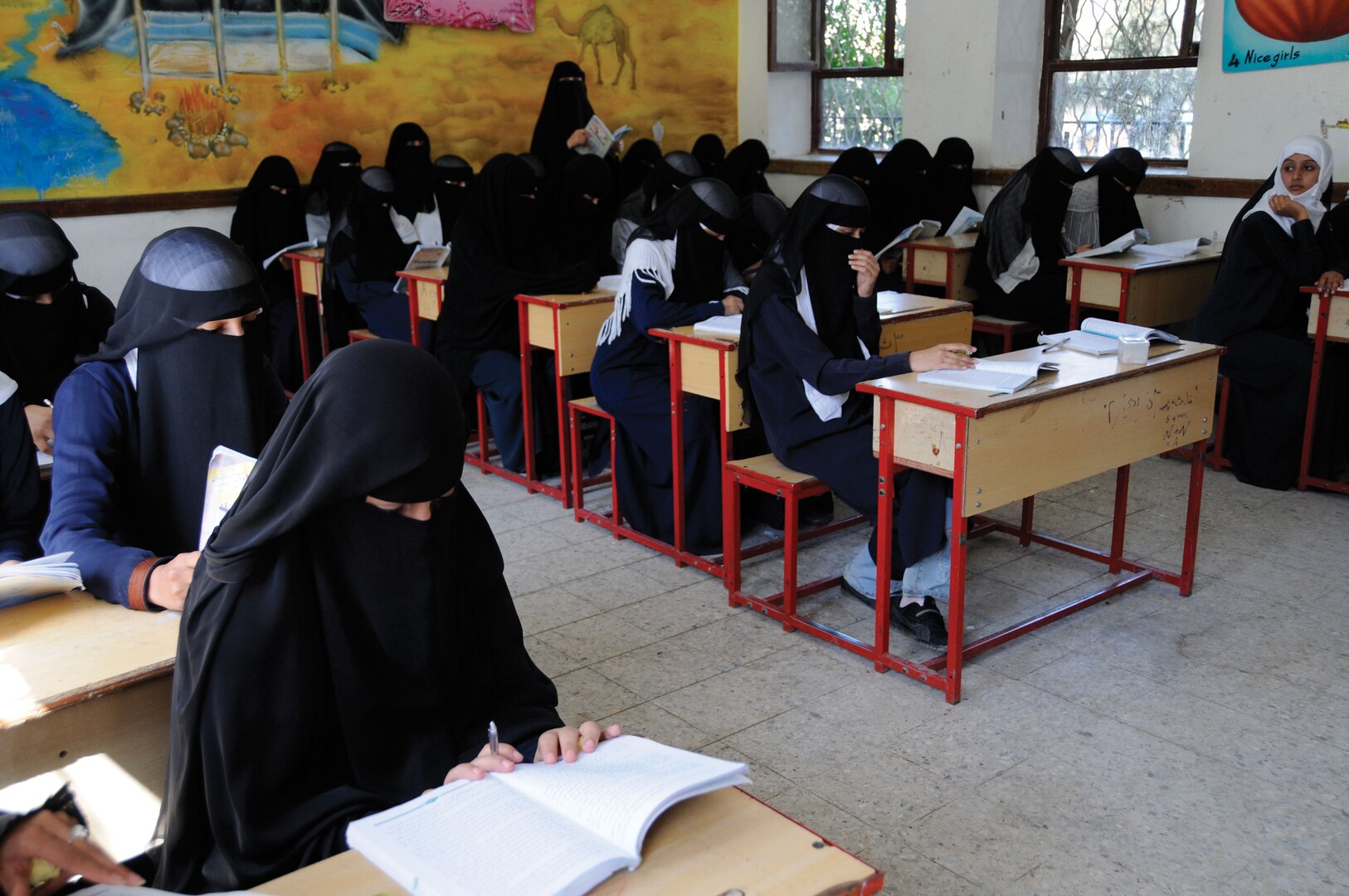 Students read in class at the Shaheed Mohamed Motaher Zaid School in Sana’a.