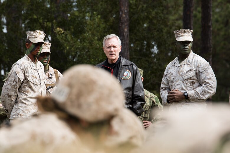 Secretary of the Navy Ray Mabus, center, speaks with Capt. Taylor Bates, left, commander of Oscar Company, 4th Recruit Training Battalion, and Capt. Larry Black Jr., commander of Delta Company, 1st Recruit Training Battalion, about the Crucible March 3, 2016, on Parris Island, S.C. Parris Island is the only place in the Marine Corps where enlisted males and females undergo 70 training days to earn the title United States Marine. Today, approximately 19,000 recruits come to Parris Island annually for the chance to become United States Marines by enduring 12 weeks of rigorous, transformative training. Parris Island is home to entry-level enlisted training for approximately 49 percent of male recruits and 100 percent of female recruits in the Marine Corps. (Photo by Staff Sgt. Greg Thomas)