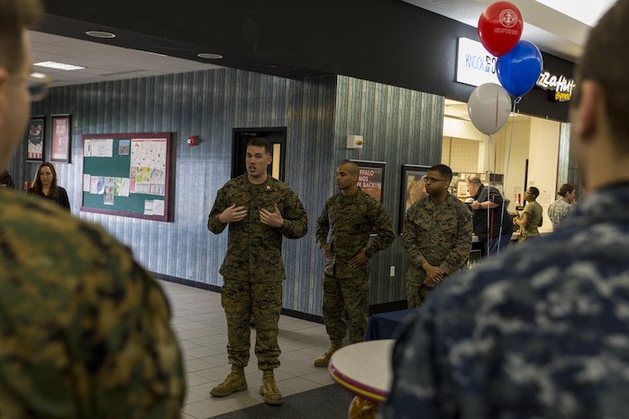 Capt. Timothy Keane, Japanese jurisdiction officer with the Staff Judge Advocates Office, delivers a speech during the kickoff of the Navy-Marine Corps Relief Society’s active duty fund drive at the Strike Zone Bowling Center at Marine Corps Air Station Iwakuni, Japan, Feb. 29, 2016. Since 1904, the NMCRS has provided assistance to Marines, Sailors and their families in times of need. Representatives from each unit ensure the service members within the unit know what the fund drive is, how funds are used to help other service members and their families, and collect donations.