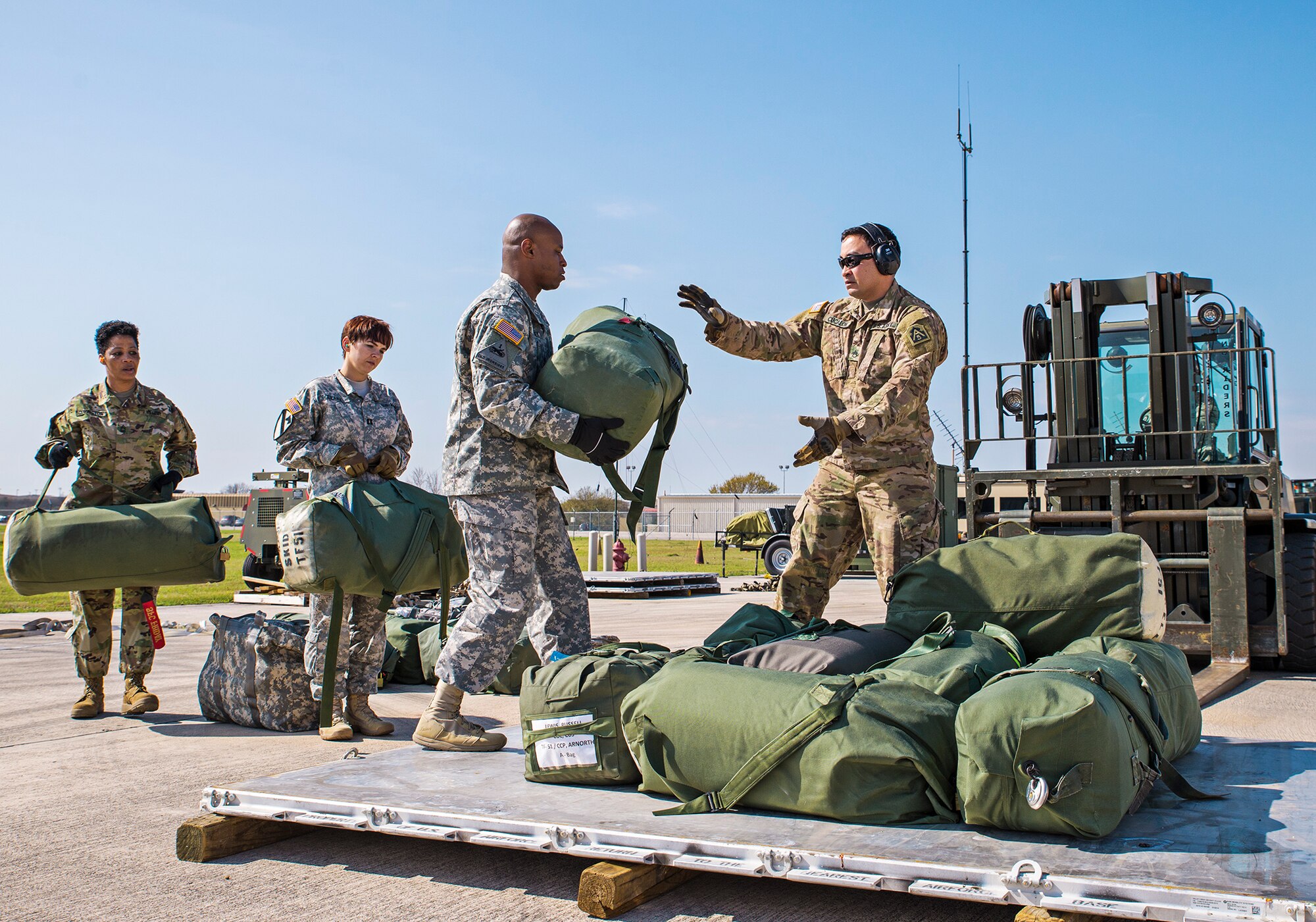 U.S. Army personnel with Army North's  Task Force 51, build deployment pallets outside the 433rd Airlift Wing's C-5 load trainer facility March 2, 2016 at Joint Base San Antonio-Lackland, Texas. Task Force 51 is responsible for overseeing Army reserve and active duty assets  in the event of a chemical, biological, radiological, nuclear, and explosives attack on U.S. soil.  (U.S. Air Force photo by Benjamin Faske) (released)