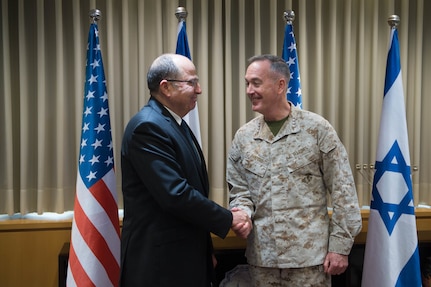 U.S. Marine Corps Gen. Joseph F. Dunford Jr., chairman of the Joint Chiefs of Staff, right, exchanges greetings with Israeli Defense Minister Moshe Yaalon at the Ministry of Defense in Tel Aviv, Israel, March 3, 2016. DoD photo by D. Myles Cullen