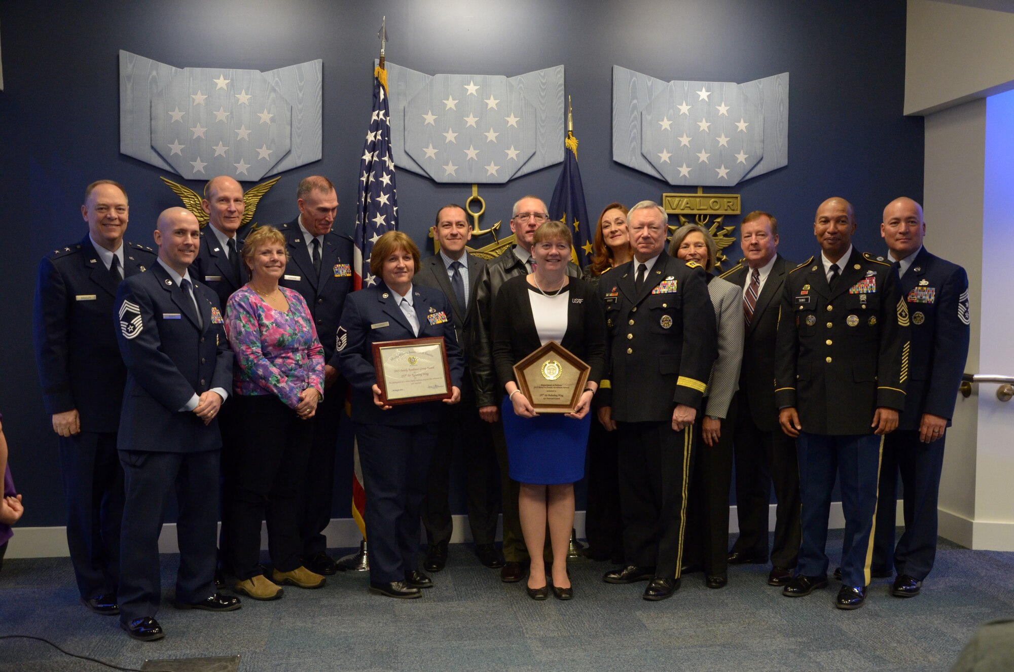Members of the 157th Air Refueling Wing Family and Airmen Readiness Program pose for a photo with Army Reserve leadership after a ceremony at the Pentagon Hall of Heroes, Feb. 26, 2016. The 157 ARW AFRP has been recognized for the third time as the best in the U.S. Air National Guard by winning a 2015 Department of Defense Reserve Family Readiness Award. (U.S. Air National Guard Photo by Tech. Sgt. Aaron Vezeau)