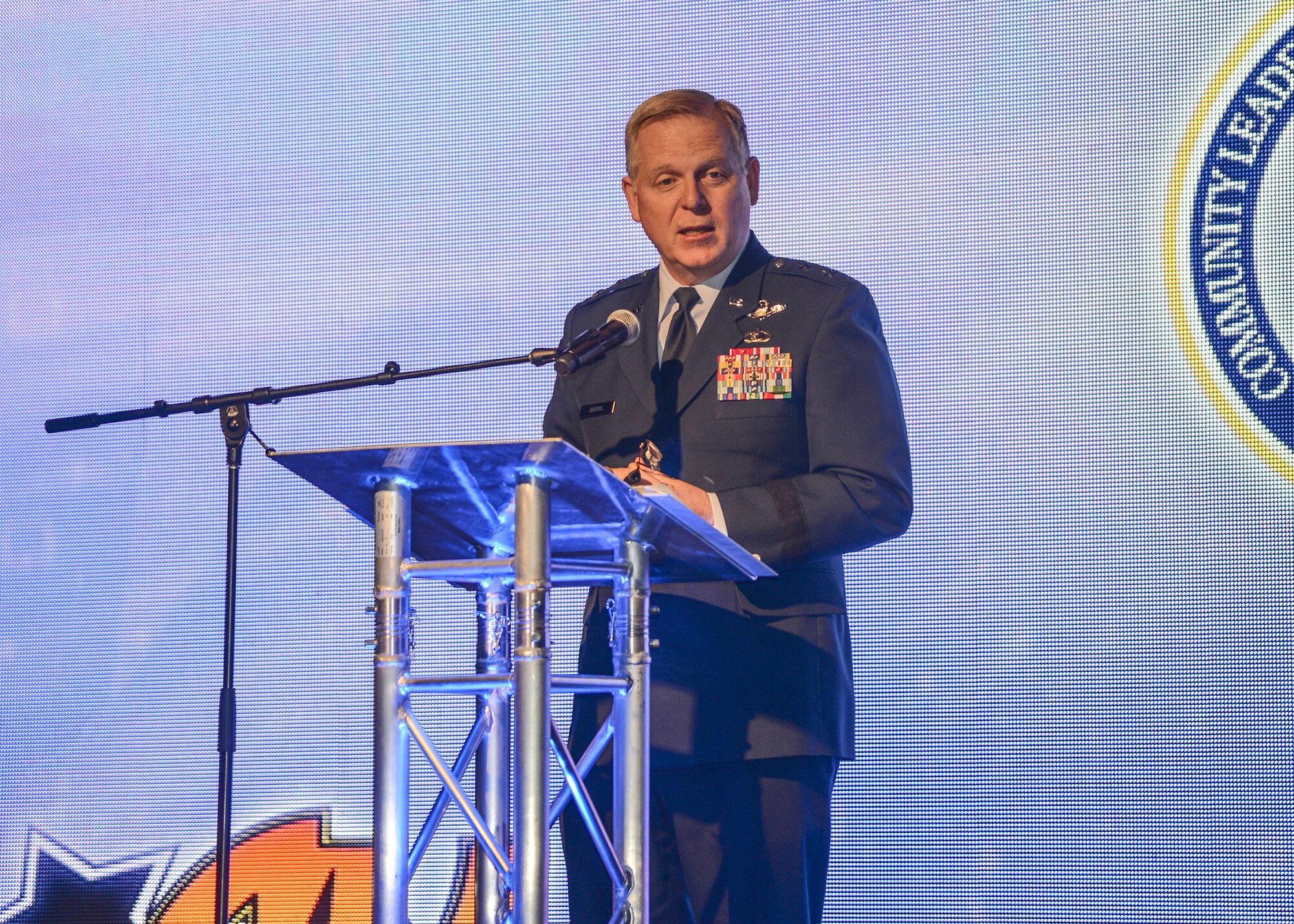 Maj. Gen. David Harris, Air Force Test Center commander, speaks at the Antelope Valley Board of Trade's Annual Business Outlook Conference Feb. 26 at the Antelope Valley Fairgrounds. Several speakers shared their thoughts on improving business in the Antelope Valley and told success stories demonstrating their positive economic impact in the community. (U.S. Air Force photo by Rebecca Amber) 