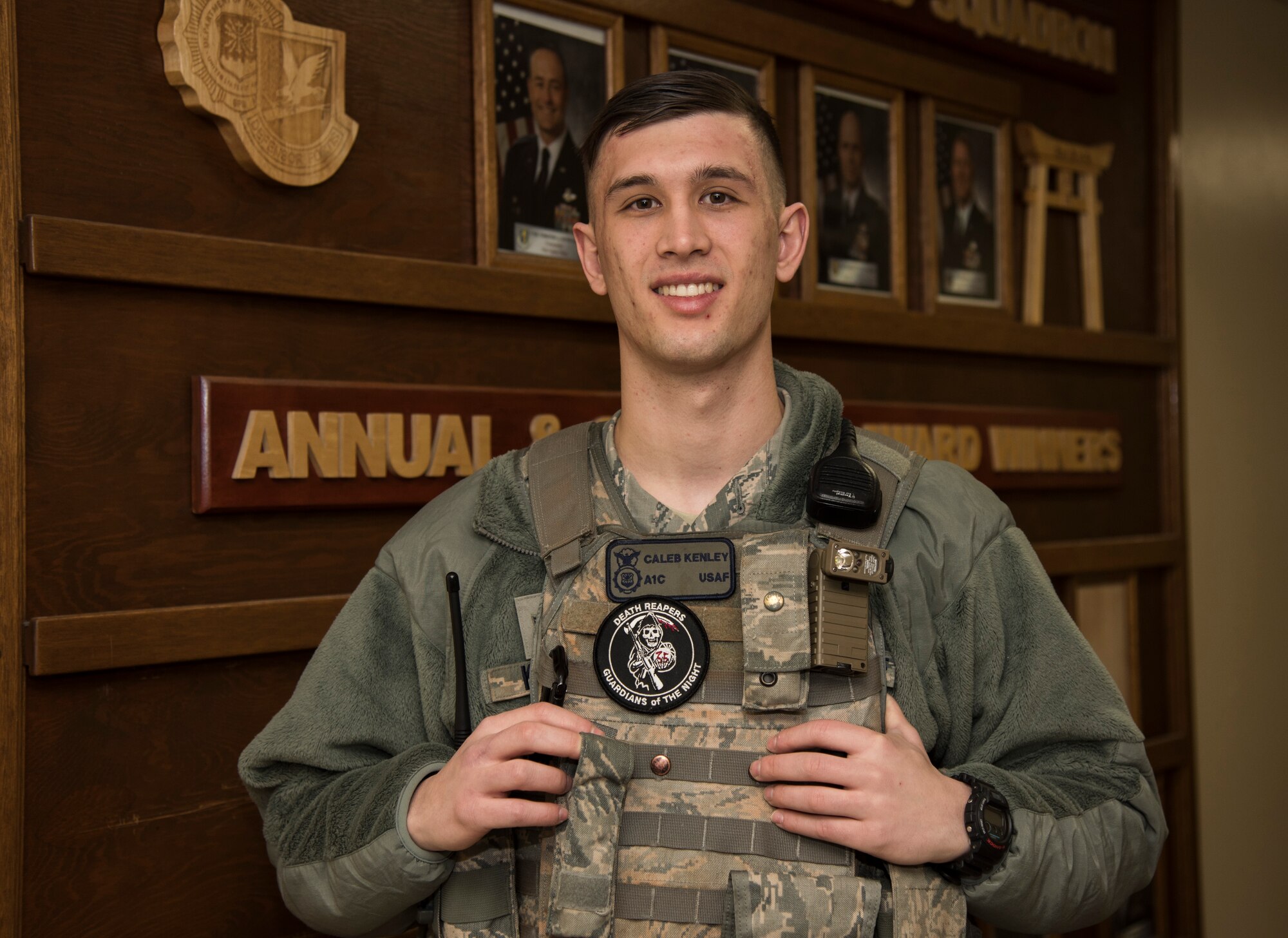 U.S. Air Force Airman 1st Class Caleb Kenley, a security response team member and installation entry controller with the 35th Security Forces Squadron, poses for a Wild Weasel of the Week portrait at Misawa Air Base, Japan, March 1, 2016. Kenley was recognized as the Wild Weasel of the Week by the 35th SFS for his superior performance, outstanding work ethic and overall good conduct and discipline. (U.S. Air Force photo by Senior Airman Brittany A. Chase)
