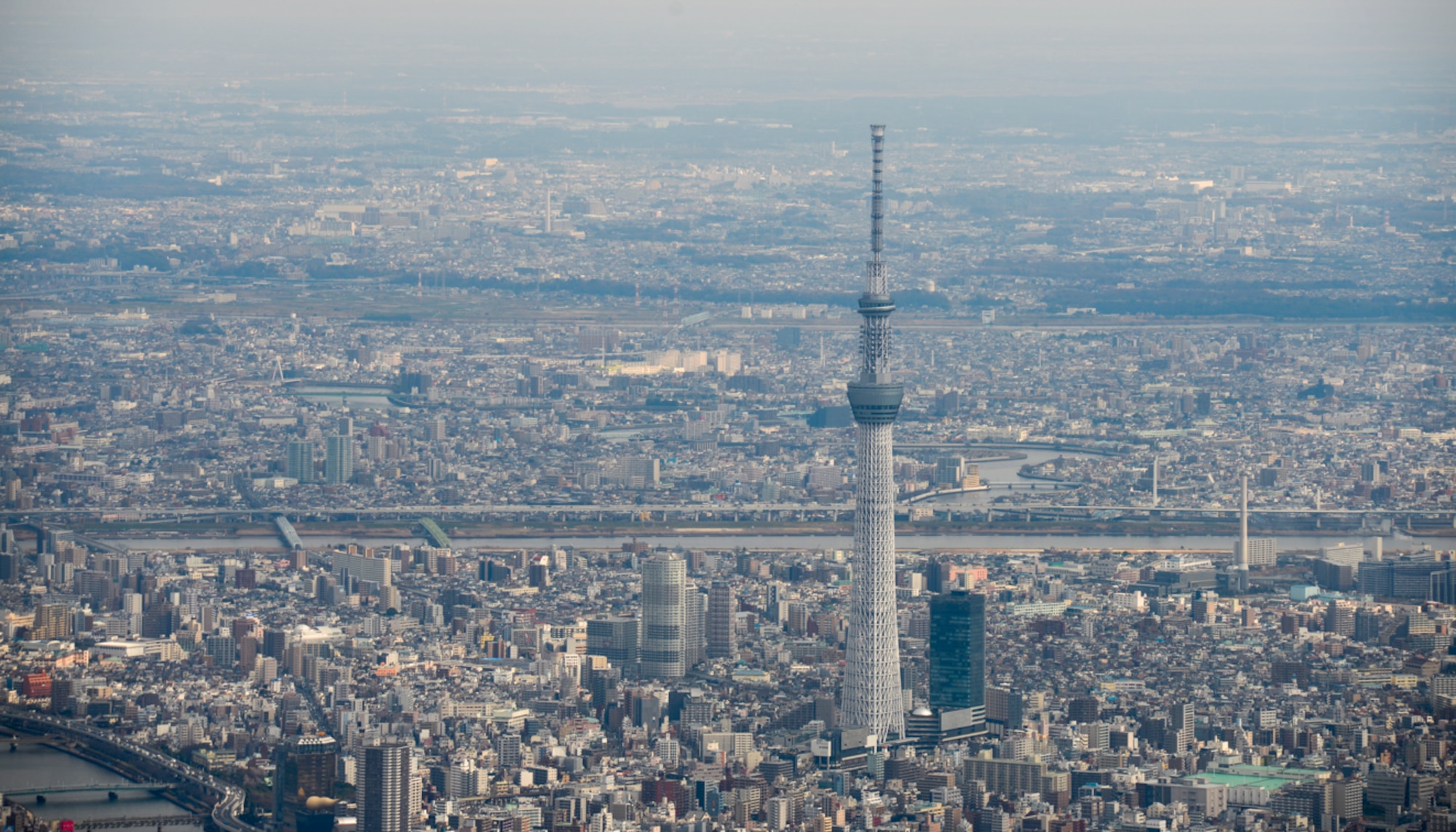 The Tokyo Sky Tree is viewed from a Yokota Aero Club and Flight Training Center Cessna during a scenic tour in Tokyo, Japan, Feb. 22, 2015. The aero club offers military personnel, Japanese citizens with Status of Forces Agreement Status and any escorted visitors the opportunity to see sweeping views of Tokyo from above. (U.S. Air Force photo by Airman 1st Class Elizabeth Baker/Released)