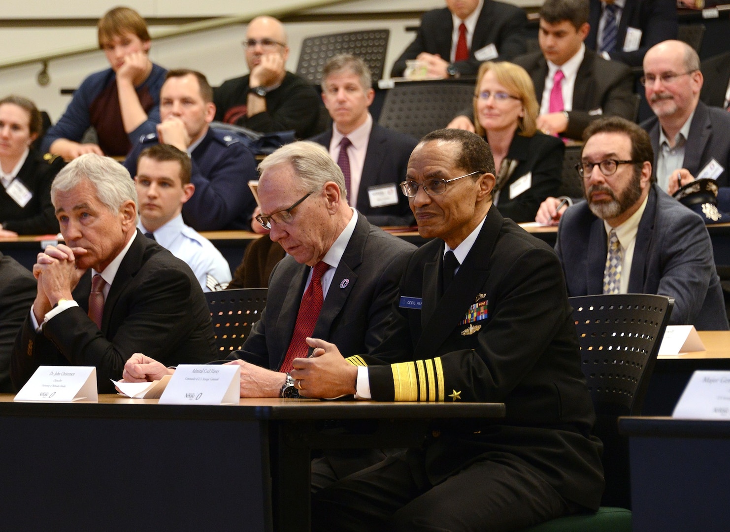 Front row, right to left: U.S. Navy Adm. Cecil D. Haney, U.S. Strategic Command (USSTRATCOM) commander; former Secretary of Defense Chuck Hagel; and Dr. John Christensen, University of Nebraska chancellor; listen to the opening remarks during the 2016 Deterrence and Assurance Workshop and Conference at the University of Nebraska at Omahaâ€™s (UNO) College of Public Affairs and Community Service, Omaha, Neb., March 3, 2016. Secretary Hagel provided the keynote address at the conference, during which he discussed the current and future strategic environment, his personal experiences as a student at UNO and USSTRATCOMâ€™s role in regional and global security. In his remarks, Haney discussed deterrence and assurance, the importance of USSTRATCOMâ€™s collaboration with academic institutions and the need to develop future leaders. Dr. Christensen also presented remarks, and introduced Secretary Hagel during the event, which was organized by the University of Nebraska at Omahaâ€™s Department of Political Science and USSTRATCOM's Deterrence and Assurance Academic Alliance. The alliance includes 23 local and national universities and was started in Oct. 2014 to stimulate new thinking and develop future generations of deterrence practitioners. One of nine DoD unified combatant commands, USSTRATCOM has global strategic missions, assigned through the Unified Command Plan, which include strategic deterrence; space operations; cyberspace operations; joint electronic warfare; global strike; missile defense; intelligence, surveillance and reconnaissance; combating weapons of mass destruction; and analysis and targeting. (USSTRATCOM photo by U.S. Air Force Staff Sgt. Jonathan Lovelady)