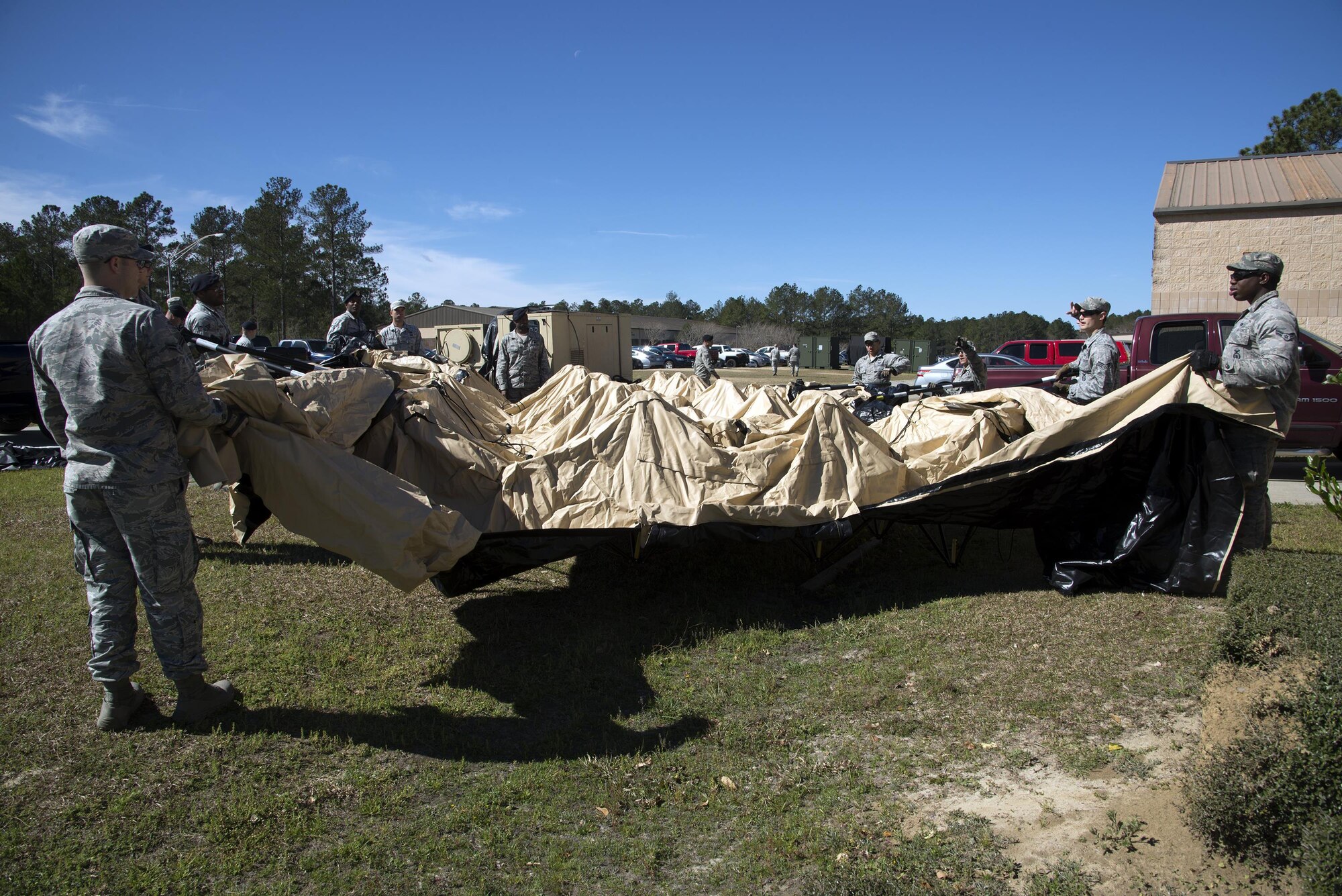 U.S. Air Force Airmen from the 823d Base Defense Squadron practice setting up temporary living quarters, March 2, 2016 at Moody Air Force Base, Ga. During this preparation, Airmen focused on getting ready for an upcoming Mission Readiness Exercise which will validate their skills and determine whether or not they will be put on stand-by status for the Global Response Force.
(U.S. Air Force photo by Airman 1st Class Janiqua P. Robinson/Released)