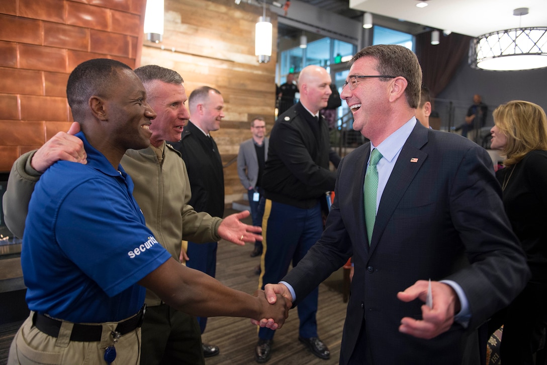 Defense Secretary Ash Carter meets a former Marine currently working for Amazon.com in Seattle, March 3, 2016. Carter is in Seattle to strengthen ties between the Department of Defense and the tech community .DoD photo by Navy Petty Officer 1st Class Tim D. Godbee