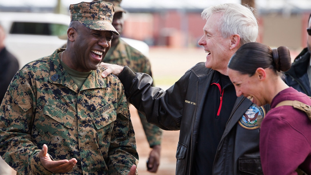 Secretary of the Navy Ray Mabus, center, speaks with Sgt. Maj. of the Marine Corps Ronald Green, left, and 1st Lt. Terri L. Piekosz, a series commander with November Company, 4th Recruit Training Battalion, March 3, 2016 at Marine Corps Recruit Depot Parris Island, S.C. Mabus visited Parris Island to see firsthand how young men and women from across the country are transformed into United States Marines. Recruit training was consolidated under Recruit Training Regiment in 1986, and since then, all those desiring to complete recruit training must follow the same training program of instruction, and must complete the same graduation requirements. 