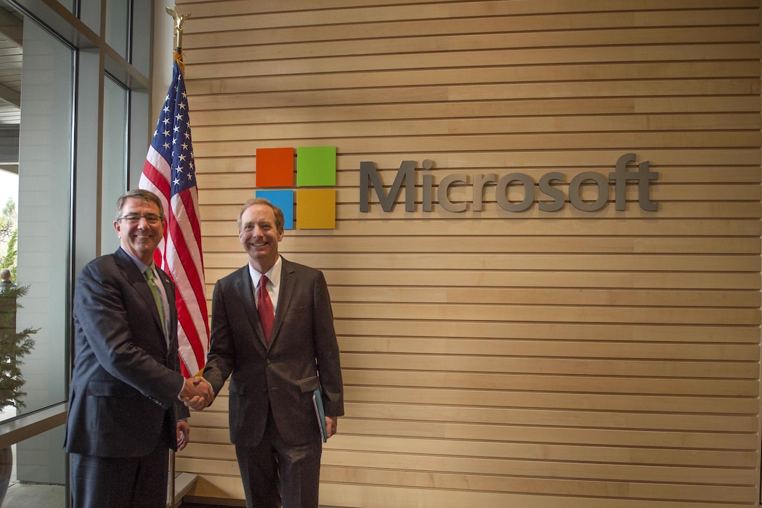 Defense Secretary Ash Carter, left, poses for a photograph with Microsoft President Brad Smith in Seattle, March 3, 2016. DoD photo by Navy Petty Officer 1st Class Tim D. Godbee