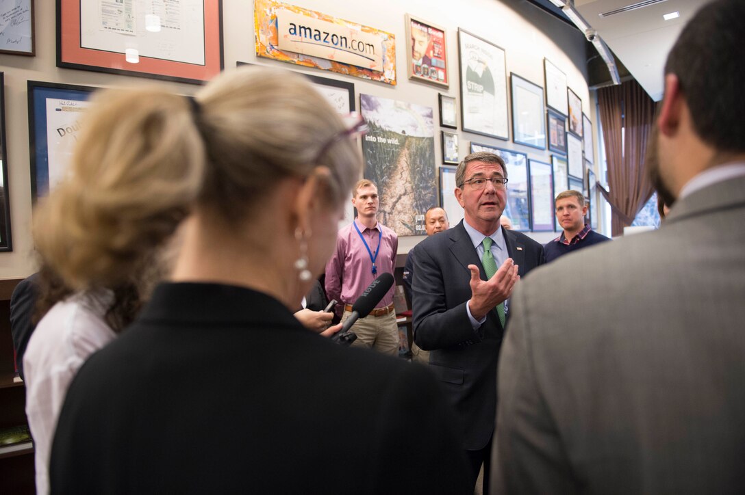 Defense Secretary Ash Carter, center, answers questions from the press in Seattle, March 3, 2016. DoD photo by Navy Petty Officer 1st Class Tim D. Godbee