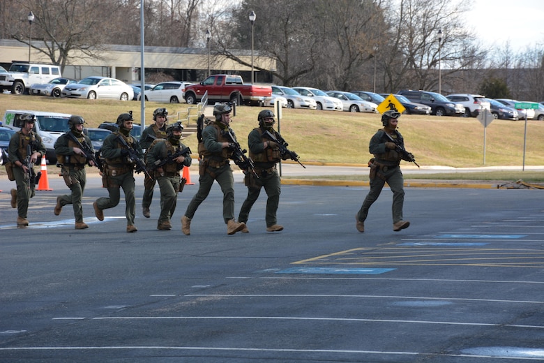 SRT Marines from Security Battalion quickly respond during an Active Shooter exercise in Lejeune Hall.