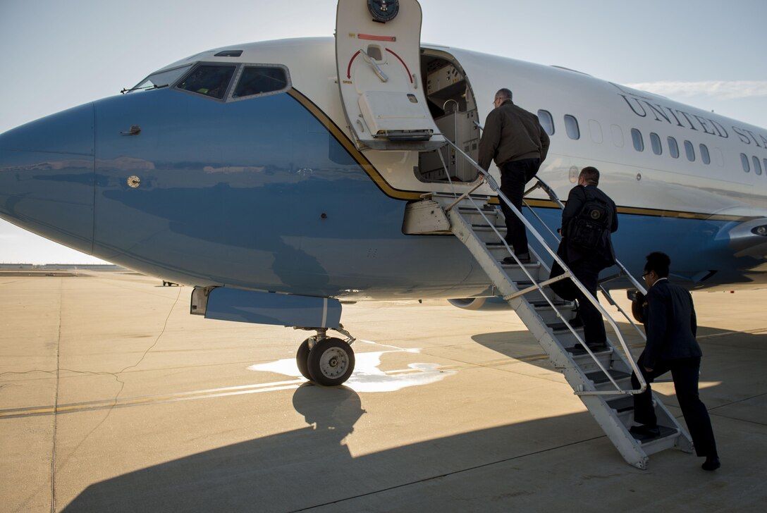 Deputy Defense Secretary Bob Work boards an aircraft at Joint Base Andrews, Md., as he departs to visit Wright-Patterson Air Force Base, Ohio, March 3, 2016. DoD photo by Air Force Senior Master Sgt. Adrian Cadiz