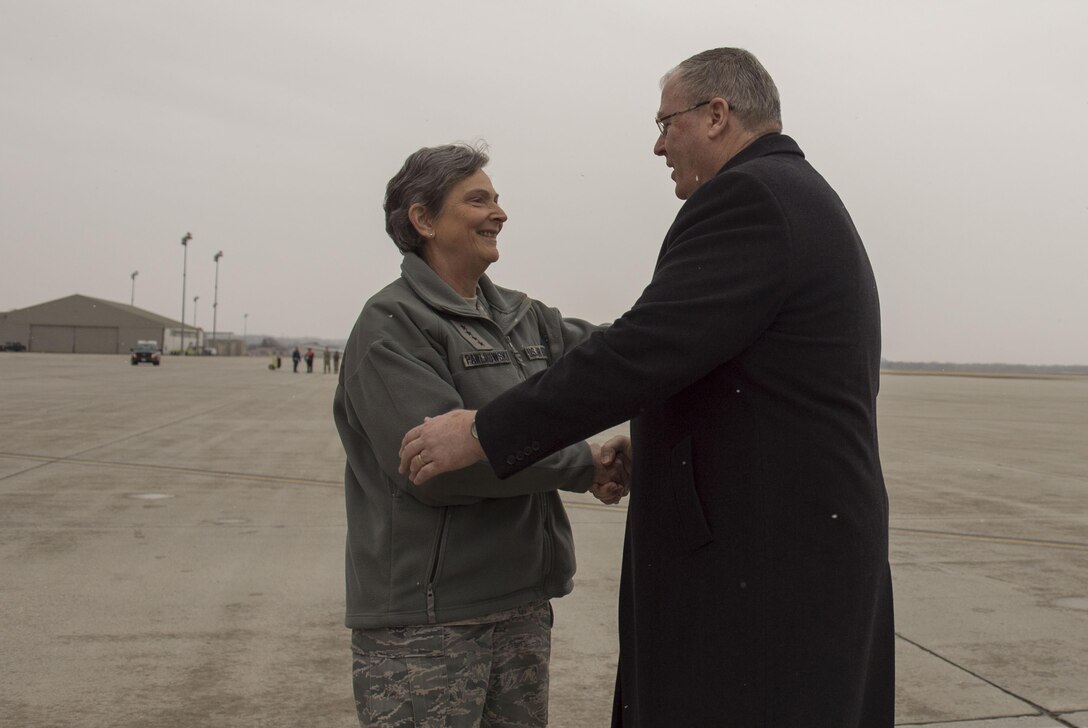 Deputy Defense Secretary Bob Work is greeted by Air Force Gen. Ellen M. Pawlikowski, commander, Air Force Materiel Command, as he arrives at Wright-Patterson Air Force Base, Ohio, for a visit and a tour of the base March 3, 2016. DoD photo by Air Force Senior Master Sgt. Adrian Cadiz