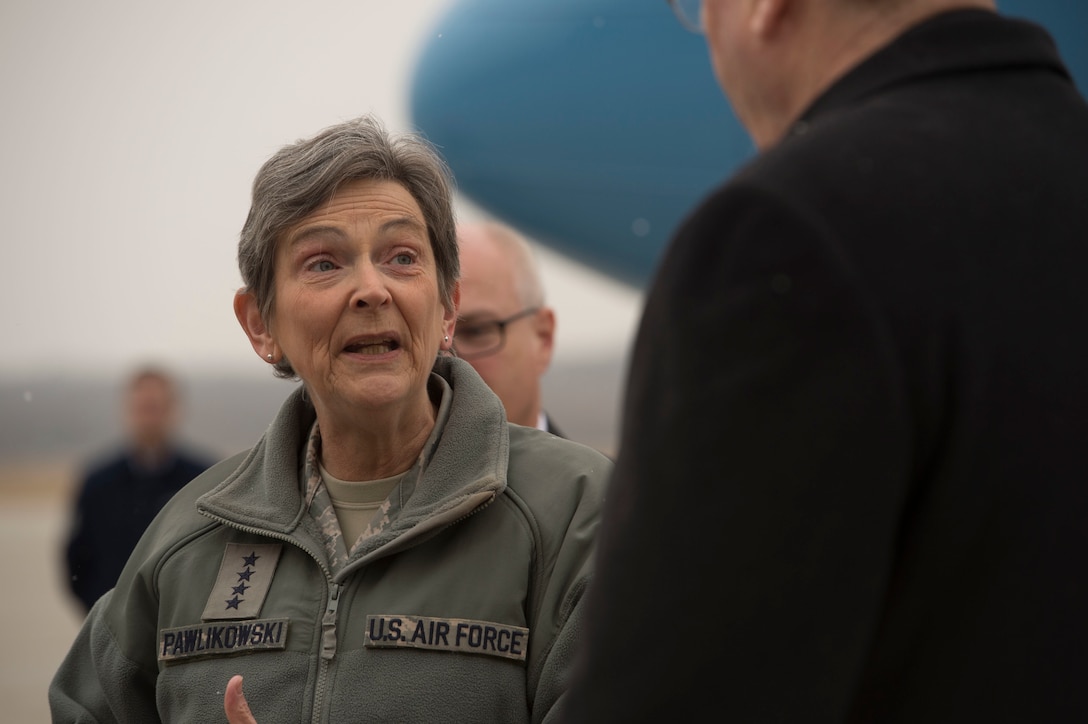 Air Force Gen. Ellen M. Pawlikowski, commander, Air Force Materiel Command, speaks with Deputy Secretary of Defense Bob Work as he arrives at Wright-Patterson Air Force Base, Ohio, for a visit and a tour of the base March 3, 2016. DoD photo by Air Force Senior Master Sgt. Adrian Cadiz