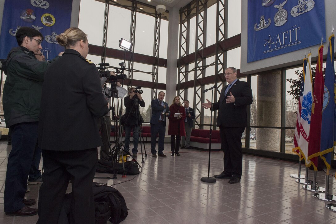 Deputy Defense Secretary Bob Work speaks with reporters during a visit to Wright-Patterson Air Force Base, Ohio, where he toured the base and spoke to students from the local Dayton, Ohio, area during the 'Week at the Labs" event March 3, 2016. DoD photo by Air Force Senior Master Sgt. Adrian Cadiz
