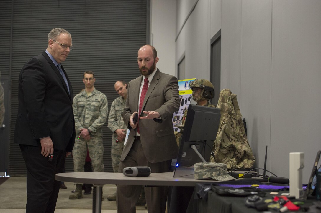 Deputy Defense Secretary Bob Work is briefed on some of the emerging military technology during a visit to Wright-Patterson Air Force Base, Ohio, where he toured the base and spoke to students from the local Dayton, Ohio, area during the 'Week at the Labs" event March 3, 2016. DoD photo by Air Force Senior Master Sgt. Adrian Cadiz
