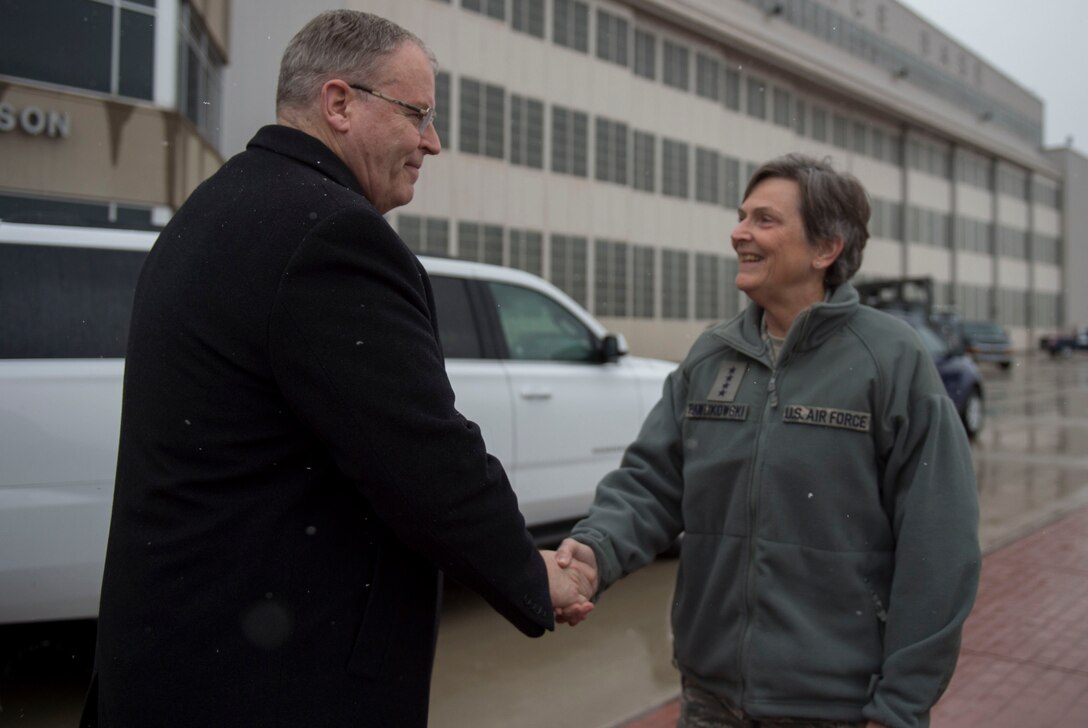 Deputy Defense Secretary Bob Work, left, says goodbye to Air Force Gen. Ellen M. Pawlikowski, commander, Air Force Materiel Command, as he departs Wright-Patterson Air Force Base, after touring the base and speaking to a group of students from the local Dayton, Ohio, area during 'Week at the Labs" event March 3, 2016. DoD photo by Air Force Senior Master Sgt. Adrian Cadiz