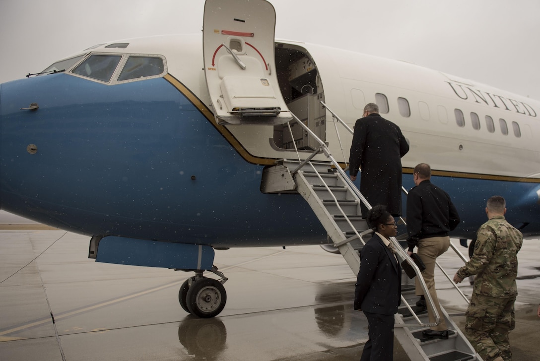 Deputy Defense Secretary Bob Work boards an aircraft as he departs Wright-Patterson Air Force Base, Ohio, after touring the base and speaking to a group of students from the local Dayton, Ohio, area during 'Week at the Labs" event March 3, 2016. DoD photo by Air Force Senior Master Sgt. Adrian Cadiz