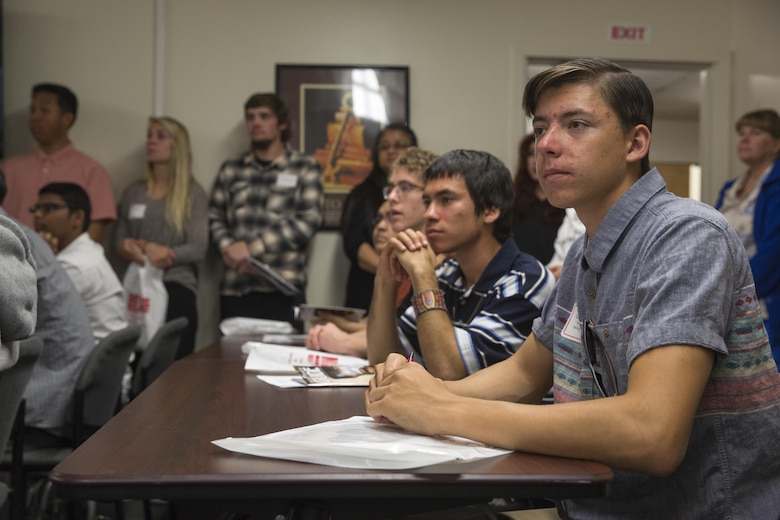 Twentynine Palms High School Students wait to meet their sponsors during the 13th annual Job Shadowing Event aboard the Combat Center Feb. 23, 2016. The event began as a partnership between the Morongo Unified School District and the installation and provides students with insight on potential careers. (Official Marine Corps photo by Lance Cpl. Levi Schultz/Released)