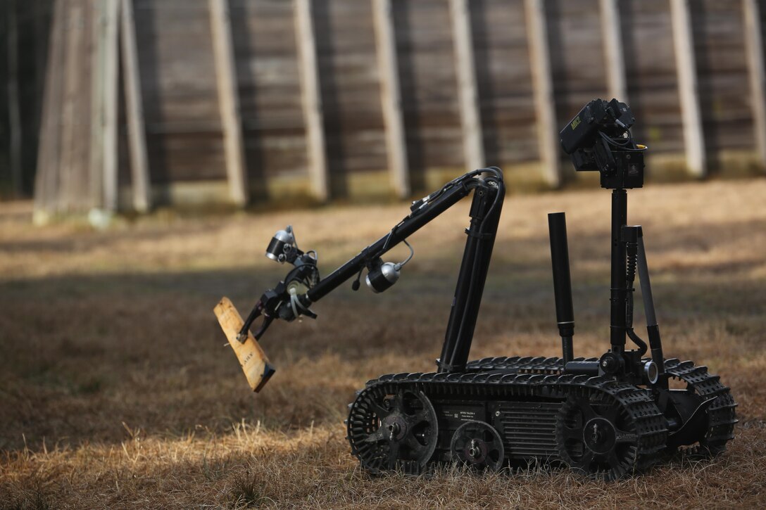 A TALON robot, operated by Marines with Explosive Ordnance Disposal  Platoon, Combat Logistics Battalion 2, scouts an area for improved explosive devices during a field exercise at Camp Lejeune, N.C., March 2, 2016. The training served as the last field operation prior to the battalion’s upcoming deployment with the Special Purpose Marine-Air Ground Task Force-Crisis Response-Africa. (U.S. Marine Corps photo by Cpl. Paul S. Martinez/Released)