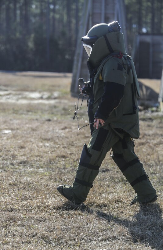 A Marine with  Explosive Ordnance Disposal  Platoon, Combat Logistics Battalion 2, prepares ordnance for detonation during a field exercise at Camp Lejeune, N.C., March 2, 2016. The training served as the last field operation prior to the battalion’s upcoming deployment with the Special Purpose Marine-Air Ground Task Force-Crisis Response-Africa. (U.S. Marine Corps photo by Cpl. Paul S. Martinez/Released)
