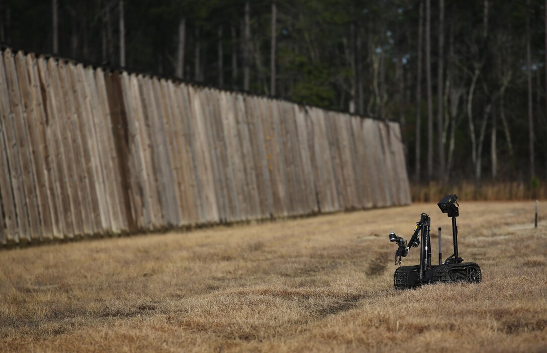 A TALON robot, operated by Marines with Explosive Ordnance Disposal  Platoon, Combat Logistics Battalion 2, scouts an area for improved explosive devices during a field exercise at Camp Lejeune, N.C., March 2, 2016. Marines used equipment such as compact metal detectors, bomb suits and a TALON robot to locate and handle ordnance, which took the form of a simulated IED, ammunition or artillery shell. (U.S. Marine Corps photo by Cpl. Paul S. Martinez/Released)