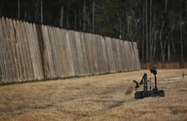 A TALON robot, operated by Marines with Explosive Ordnance Disposal  Platoon, Combat Logistics Battalion 2, scouts an area for improved explosive devices during a field exercise at Camp Lejeune, N.C., March 2, 2016. Marines used equipment such as compact metal detectors, bomb suits and a TALON robot to locate and handle ordnance, which took the form of a simulated IED, ammunition or artillery shell. (U.S. Marine Corps photo by Cpl. Paul S. Martinez/Released)