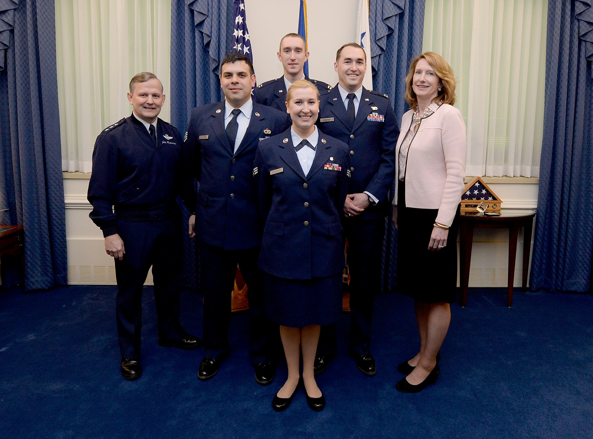 Lt. Gen. John Hesterman, the Air Force assistant vice chief of staff, and Under Secretary of the Air Force Lisa S. Disbrow congratulate Team 3-D Printing in the Pentagon, Feb. 29, 2016. (U.S. Air Force photo/Scott M. Ash)