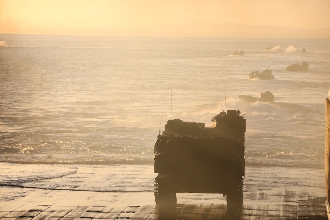 An Assault Amphibious Vehicle prepares to launch from the USS Essex (LHD 2) to the shore of Camp Pendleton Feb. 24, 2016. The launch marked the start of Company A, 3rd Assault Amphibian Battalion’s, Marine Corps Combat Readiness Evaluation, which tested the unit’s preparation for its upcoming deployment to Okinawa, Japan. (U.S. Marine Corps photo by Lance Cpl. Timothy Valero/ Released)