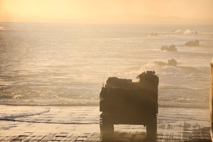 An Assault Amphibious Vehicle prepares to launch from the USS Essex (LHD 2) to the shore of Camp Pendleton Feb. 24, 2016. The launch marked the start of Company A, 3rd Assault Amphibian Battalion’s, Marine Corps Combat Readiness Evaluation, which tested the unit’s preparation for its upcoming deployment to Okinawa, Japan. (U.S. Marine Corps photo by Lance Cpl. Timothy Valero/ Released)
