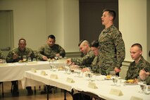 Lake Orion, Miss.- native Cpl. Demetri X. Duey, a rescue man with Reaction Force Company, Chemical Biological Incident Response Force (CBIRF), address the Vice-President of the Mess during a Mess Night at the Mix House aboard Naval Support Facility Indian Head, Md., Feb. 25, 2016. Corporals with CBIRF, U.S. Marine Forces Command (MARFORCOM), participated in the time-honored tradition of a Marine Corps Mess night with guest of honor Sgt. Maj. Robert G. VanOostrom, sergeant major of manpower and reserve affairs, the night prior to their graduation from the course. The noncommissioned officers completed the 3 week course curriculum that included sword and guidon manual, land navigation, Marine Corps promotion system for sergeants and below and other small unit leader skills and traits. (Official USMC Photos by Sgt. Santiago G. Colon Jr./Released)
