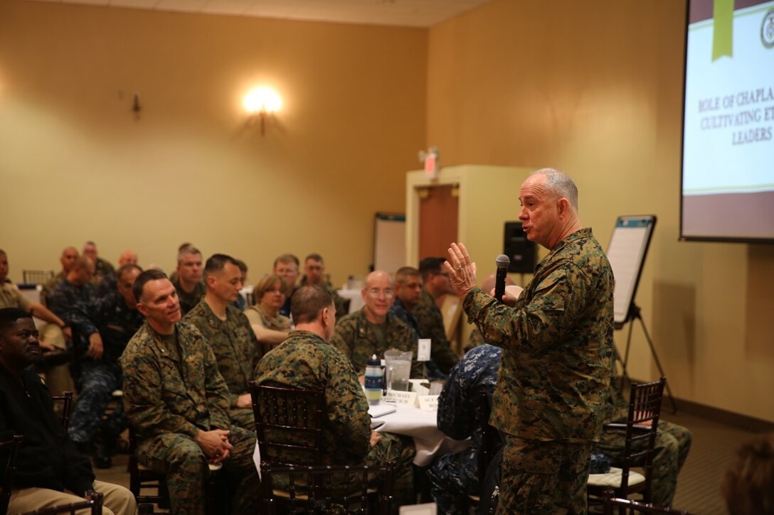 Rear Adm. Brent Scott gives the opening remarks for the first Professional Naval Chaplaincy Excellence award ceremony at Camp Pendleton, Feb. 23, 2016. The ceremony recognized Lt. Michael Kennedy and Petty Officer 3rd Class Dawaylon Farr for going above and beyond the call of duty to provide spiritual guidance and renewed faith to Marines and sailors serving I Marine Expeditionary Force. Scott is the 19th Chaplain of the Marine Corps and Deputy Chief of Navy Chaplains. Kennedy is a chaplain with 1st Battalion, 1st Marine Regiment, 1st Marine Division. Farr is a religious program specialist with 1st Bn., 4th Marine Regiment, 1st Mar. Div. (U.S. Marine Corps photo by Pvt. Robert Bliss/Released)