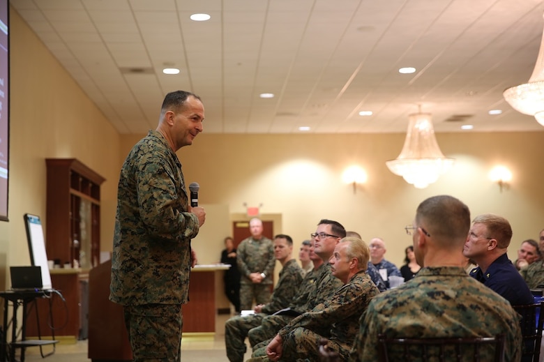 Maj. Gen. Daniel J. O'Donohue speaks at the Naval Chaplaincy Excellence award ceremony at Camp Pendleton, Feb. 23, 2016. The ceremony recognized Lt. Michael Kennedy and Petty Officer 3rd Class Dawaylon Farr for going above and beyond the call of duty to provide spiritual guidance and renewed faith to Marines and sailors serving I Marine Expeditionary Force. O’Donohue, the commanding general of 1st Marine Division, was a guest speaker and presented awards to the recipients.  Kennedy is a chaplain with 1st Battalion, 1st Marine Regiment, 1st Mar. Div. Farr is a religious program specialist with 1st Bn., 4th Marines. (U.S. Marine Corps photo by Pvt. Robert Bliss/Released)