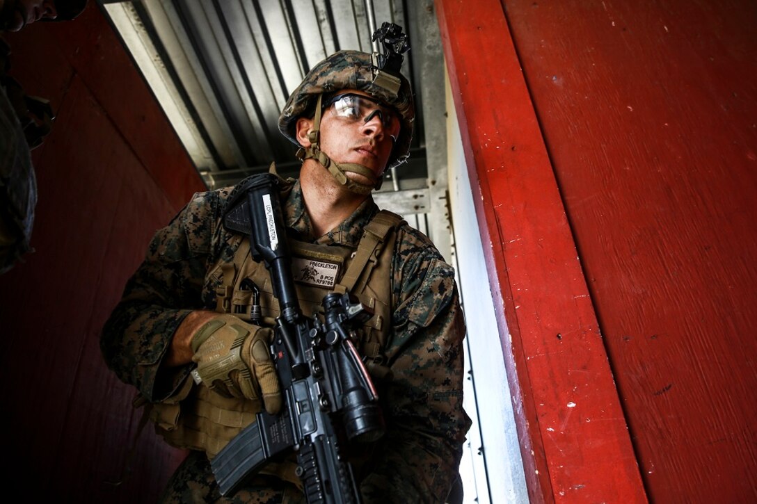 Lance Cpl. Roger Freckleton gets into position as the point man for his fire team during combat marksmanship training at Camp Pendleton March 2, 2016. The training was part of the Urban Leaders Course taught by 1st Marine Division Schools. The course focuses on enhancing small unit leadership through integrated training and implementation of fire teams and squad-sized elements in an urban setting. Freckleton is a scout rifleman with 1st Light Armored Reconnaissance Battalion, 1st Mar. Div., and a St. Augustine, Florida, native.  (U.S.  Marine Corps photo by Sgt. Emmanuel Ramos/Released)