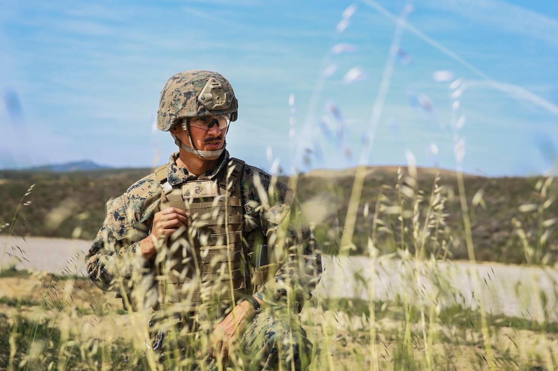 Cpl. Greg Terrazas provides notional security while his team executes a casualty evacuation during combat marksmanship training at Camp Pendleton March 2, 2016. The training was part of the Urban Leaders Course taught by 1st Marine Division Schools. The course focuses on enhancing small unit leadership through integrated training and implementation of fire teams and squad-sized elements in an urban setting. Terrazas is a squad leader with 2nd Battalion, 5th Marine Regiment, 1st Mar. Div., and is a San Antonio native. (U.S.  Marine Corps photo by Sgt. Emmanuel Ramos/Released)