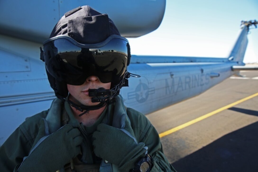 Lance Cpl. Gerald J. Demontmollin III stands in front of a UH-1Y Venom aircraft Feb. 24, 2016, at Camp Pendleton. Demontmollin and his squadron performed simulated assault and close air support training to maintain unit readiness. Demontmollin, from Grass Valley, is a crew chief with Marine Light Attack Helicopter Squadron 169, Marine Aircraft Group 39, 3rd Marine Air Wing.  (U.S. Marine Corps photo by Lance Cpl. Justin E. Bowles)