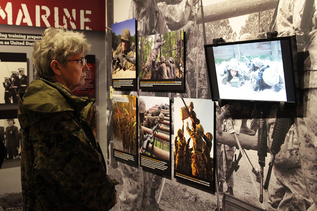 Judy Johnson watches a video of the training phases a recruit will go through during Marine Corps bootcamp March 3, 2016, at the Parris Island Museum aboard Marine Corps Recruit Depot Parris Island, S.C. Visiting the Parris Island Museum is one of the many parts of the Educators Workshop, which is a three-day event that will give the educators a chance to experience the day-to-day routines aboard the depot and Marine Corps Air Station Beaufort, S.C. Johnson is a math teacher at Central Gwinnett High School in Lawrenceville, Ga. (Official Marine Corps photo by Cpl. Diamond N. Peden/Released)