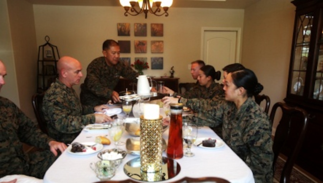 Brigadier Gen. David A. Ottignon, the 1st Marine Logistics Group commanding general, Master Chief Petty Officer Harlan B. Patawaran, the command master chief of 1st MLG, and Sgt. Maj. Troy E. Black, the sergeant major of 1st MLG, share lunch with meritoriously promoted sergeants aboard Camp Pendleton, Calif., Feb. 23, 2016. The gathering served as an ideal opportunity for the four meritoriously promoted sergeants to draw on the leaders’ knowledge and experience through discussions of leadership, work ethic, family life, and what it means to be a sergeant of Marines. The four Marines promoted included Sgt. Casey Primeaux, a combat engineer with 7th Engineer Support Battalion, Sgt. Nadia Gonzalezdiez, a food service specialist with Food Service Company, Headquarters Regiment, Sgt. Ryan Langham, a communications maintenance technician with Combat Logistics Battalion 5, and Sgt. Tyrose Lawas, a warehouse clerk with Combat Logistics Regiment 15, all under 1st MLG.