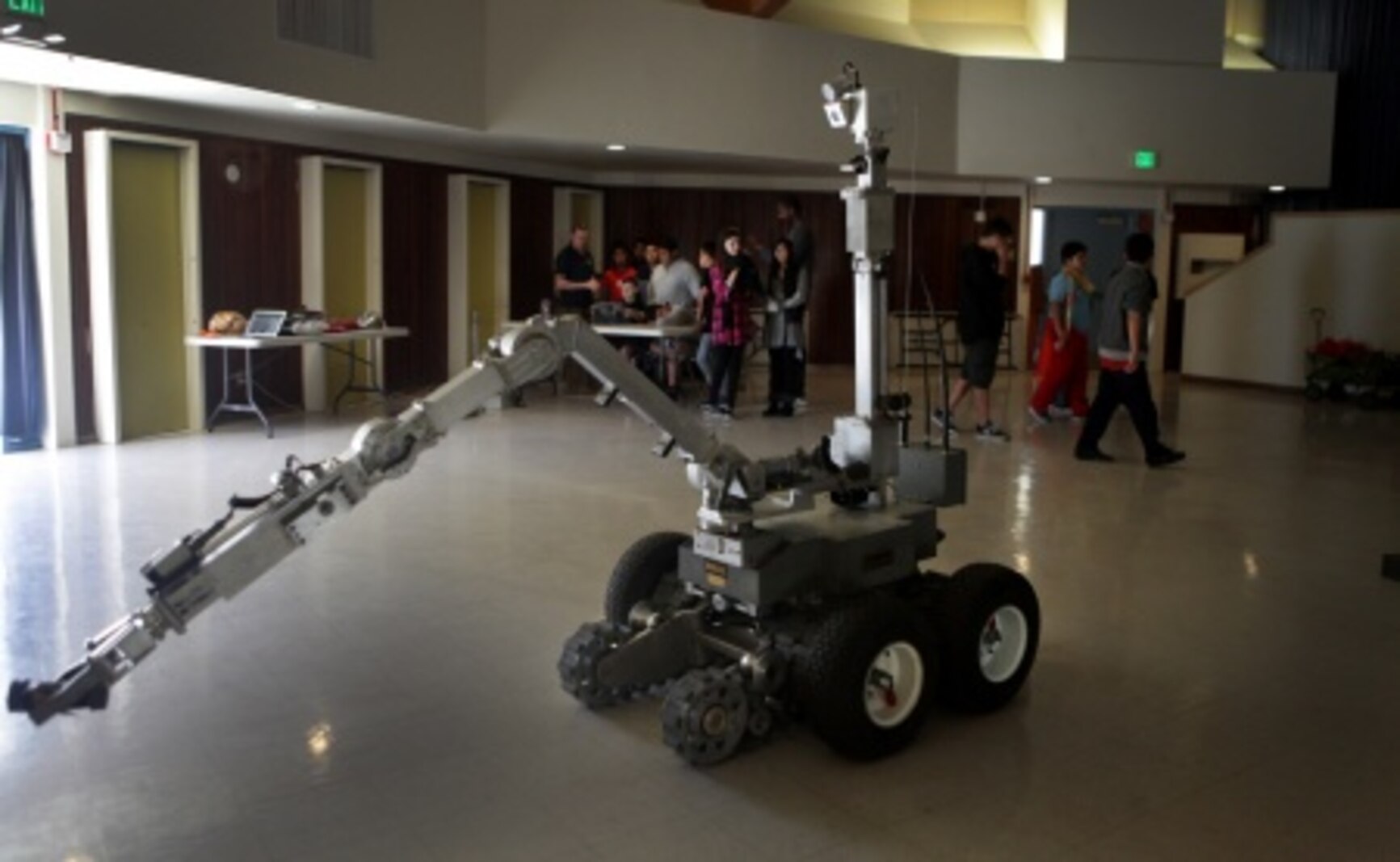 Explosive Ordnance Disposal technicians with 1st EOD Co., 7th Engineer Support Battalion, 1st Marine Logistics Group, showcase the mechanics of the ANDROS EOD robot to James E. Potter Junior High School students during a visit to the school in Fallbrook, Calif., Feb. 29, 2016. During the visit, EOD Marines explained the various capabilities of military robots and performed a practical application of EOD’s bomb-detecting robots.