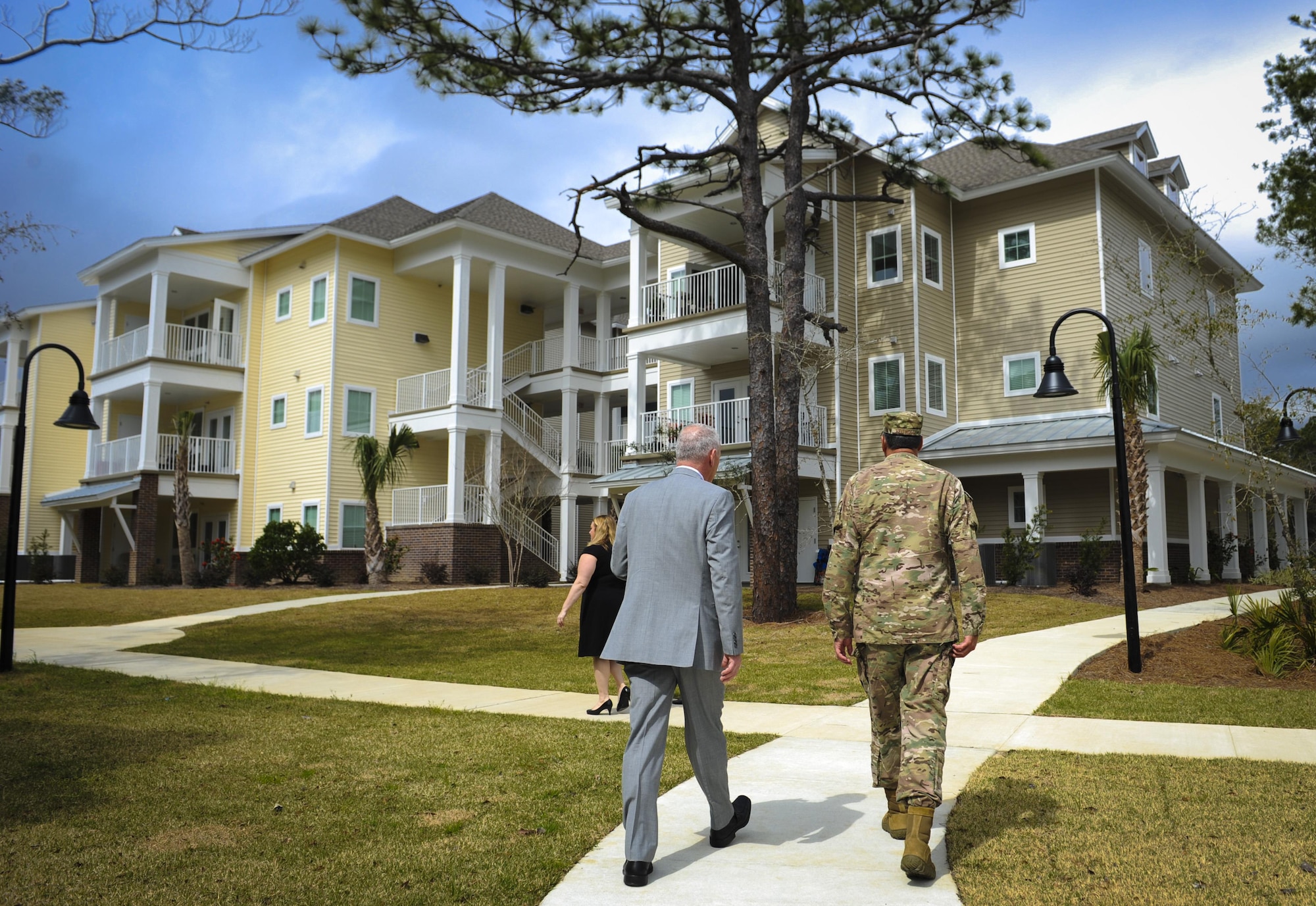 Lt. Gen. Brad Heithold, commander of Air Force Special Operations Command, and retired Chief Master Sgt. Brooke Mclean, president and CEO of Air Force Enlisted Village, walk through Bob Hope Village 5 at the AFEV, Shalimar, Fla., March. 1, 2016. The AFEV is a nonprofit organization whose core mission is to provide a safe, secure home for surviving spouses of retired enlisted U.S. Airmen and is one of four charities included in the Air Force Assistance Fund campaign.  The AFSOC AFAF campaign will run from March 21 - April 29. (U.S. Air Force photo by Senior Airman Meagan Schutter)