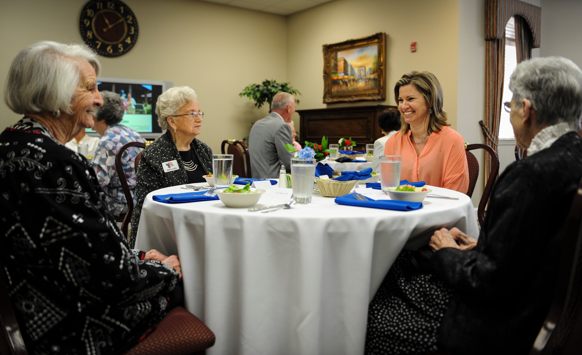 Becky Caruso, wife of Chief Master Sgt. Matt Caruso, command chief of Air Force Special Operations Command, has lunch with Hawthorn House residents during a visit to the Air Force Enlisted Village in Shalimar, Fla., March. 1, 2016. The AFEV is a nonprofit organization whose core mission is to provide a safe, secure home for surviving spouses of retired enlisted U.S. Airmen and is one of four charities included in the Air Force Assistance Fund campaign.  The AFSOC AFAF campaign will run from March 21 - April 29. (U.S. Air Force photo by Senior Airman Meagan Schutter)