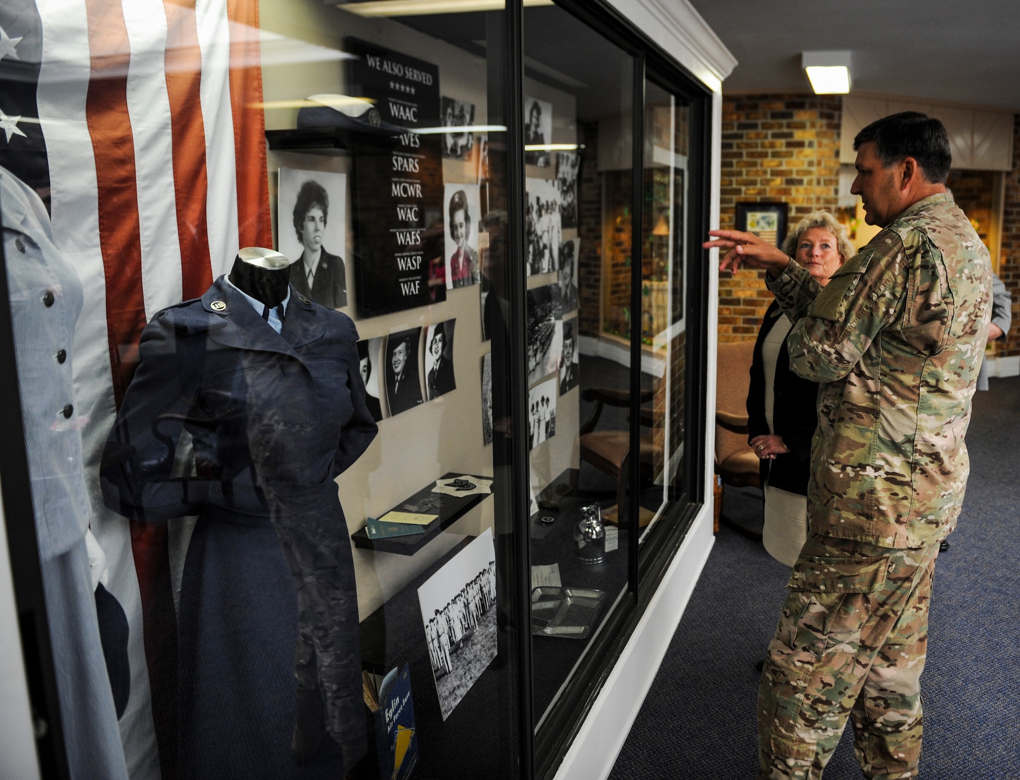 Lt. Gen. Brad Heithold, commander of Air Force Special Operations Command, looks at a memorabilia display at the Air Force Enlisted Village, Shalimar, Fla., March. 1, 2016. The AFEV is a nonprofit organization whose core mission is to provide a safe, secure home for surviving spouses of retired enlisted U.S. Airmen and is one of four charities included in the Air Force Assistance Fund campaign.  The AFSOC AFAF campaign will run from March 21 - April 29. (U.S. Air Force photo by Senior Airman Meagan Schutter)