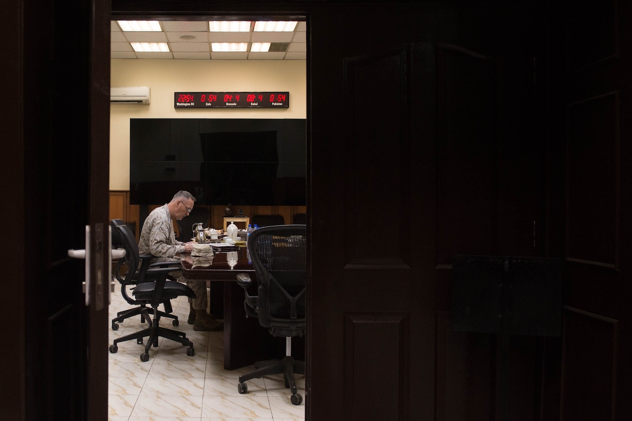 Chairman of the Joint Chiefs of Staff Marine Corps Gen. Joseph F. Dunford Jr., works between meetings at the Resolute Support Mission headquarters in Kabul, Afghanistan, Mar. 2, 2016. DoD photo by D. Myles Cullen