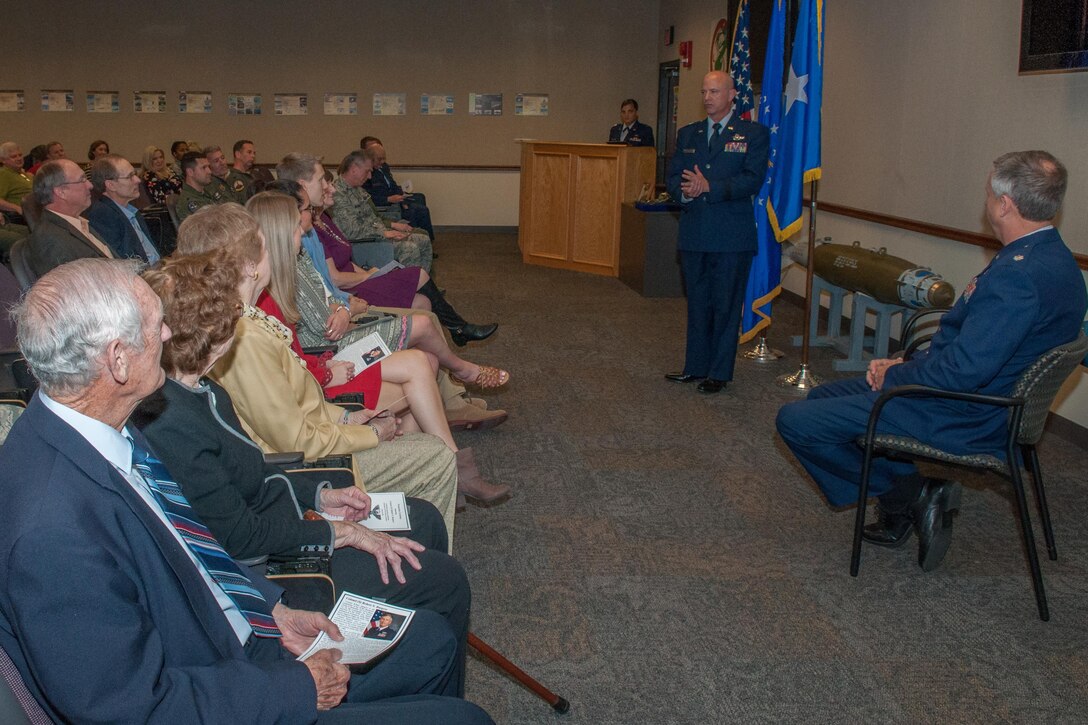 U.S. Air Force Brig. Gen. Jon Ellis, the mobilization assistant to the Director of Operations, Headquarters Air Force Global Strike Command, presides over the promotion ceremony for Col. Robert Burgess, the commander of the 307th Operations Group. Burgess is promoted to the rank of colonel in a ceremony with his family and friends on Barksdale Air Force Base, La. on March 4, 2016. (U.S. Air Force photo by Master Sgt. Dachelle Melville/Released)