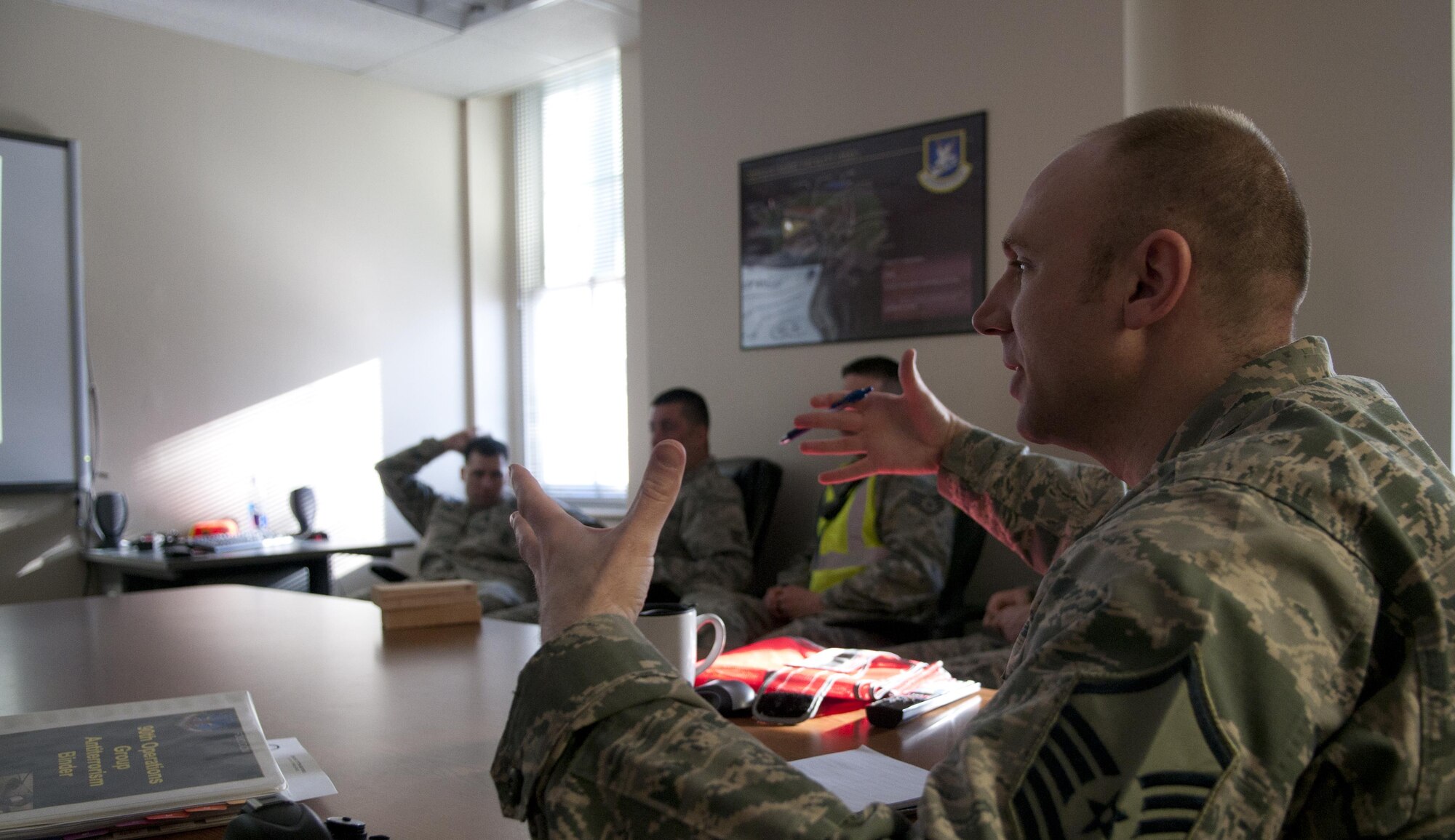 Master Sgt. Ryan Miller, 90th Security Forces Group Standardization and Evaluation superintendent, goes over an active shooter training scenario that would take place at the base theater on F.E Warren Air Force Base, Wyo., Feb. 29, 2016, before  the exercise begins later that morning. The wing performs a number of trainings each year that focus on improving readiness. (U.S. Air Force photo by Airman 1st Class Malcolm Mayfield)