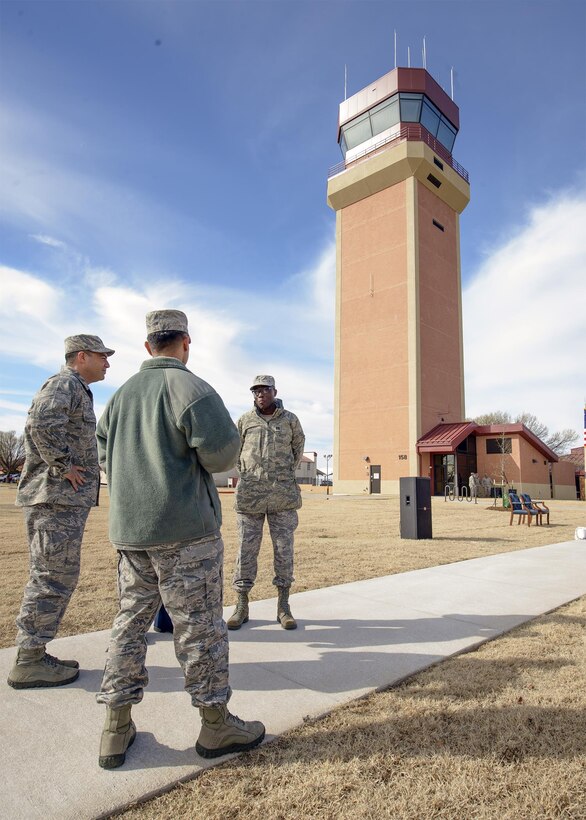 Vance Airmen at the foot of Inhofe Air Traffic Control Tower at Vance Air Force Base, Oklahoma, March 4. The more than nine story tower replaced Vance's almost 50 year old facility in mid-December. (U.S. Air Force photo / David Poe)