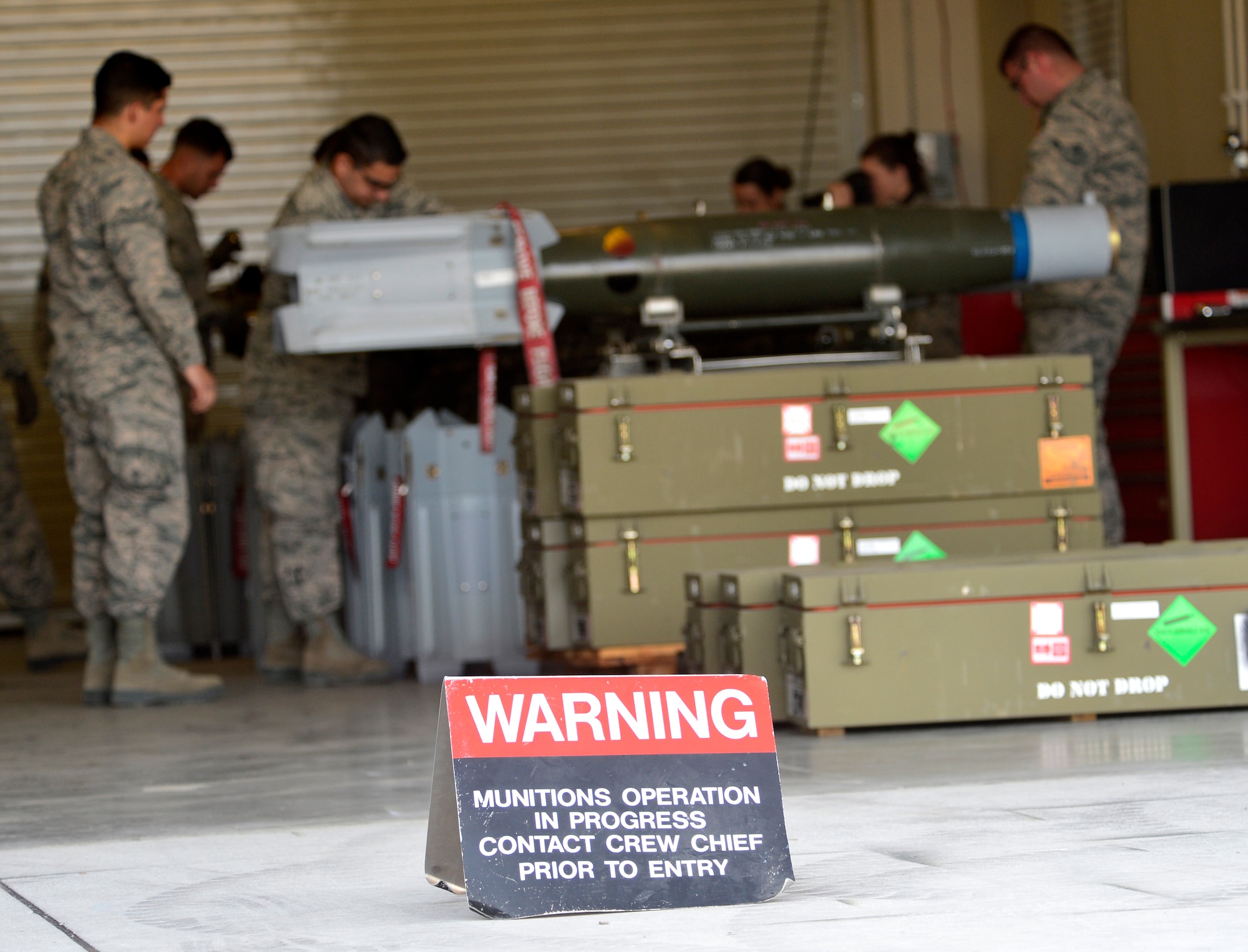 The 432nd Maintenance Squadron munitions flight prepares to build six GBU-12 Paveway II laser-guided bombs March 1, 2016 at Creech Air Force Base, Nevada. Recently, the flight prepared 60 AGM-114 Hellfire missiles in 24 hours to alleviate a munitions shortage in the area of responsibility. (U.S Air Force photo by Senior Airman Christian Clausen/Released)