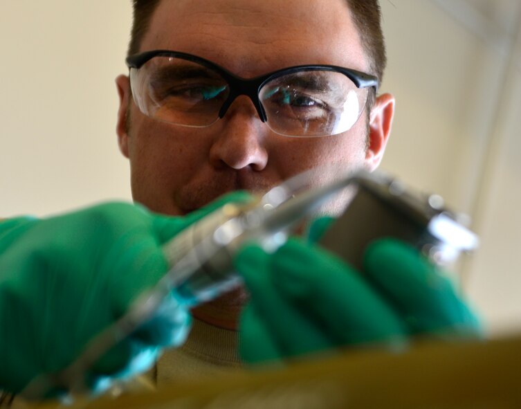 Staff Sgt. Anthony, 432nd Maintenance Squadron munitions flight crew chief, secures a fuse onto the GBU-12 Paveway II laser-guided bomb March 1, 2016 at Creech Air Force Base, Nevada. During bomb builds, Airmen from the production section work closely together to ensure munitions are properly built and moved on to trailers to be moved to the flight line. Leadership also works on the bombs to ensure with their Airmen to provide guidance at a pace that is both consistent and fun, while also keeping safety at the forefront. (U.S Air Force photo by Senior Airman Christian Clausen/Released)